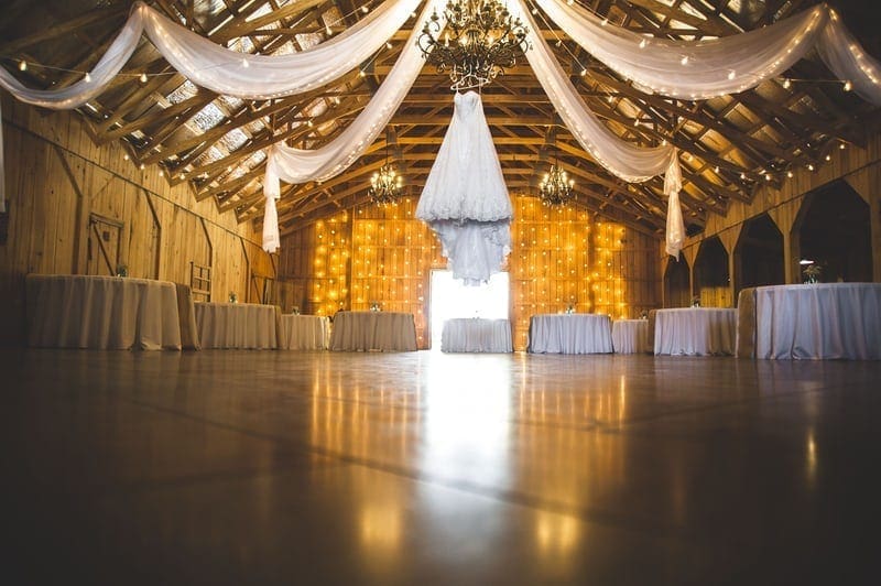 wedding-barn-venue Wedding in barn with lighting and tables