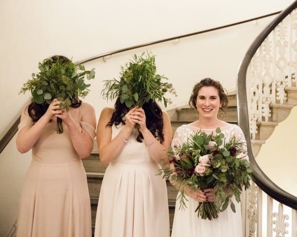 Bride with her bridal party and beautiful bouquets