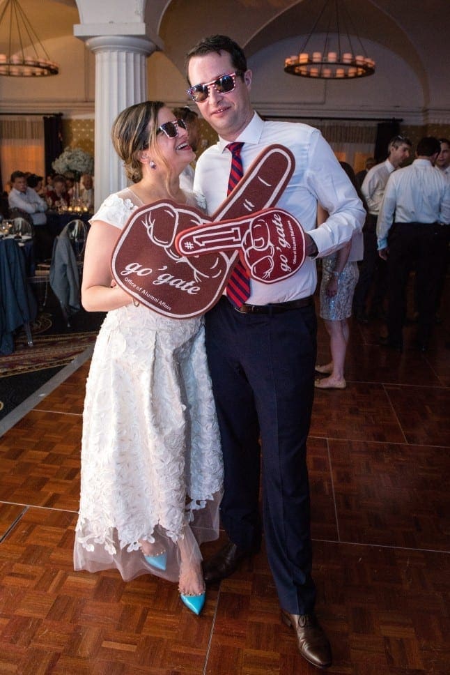 Bride and groom with college sportswear