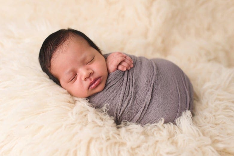 newborn baby photo swaddled in flokati