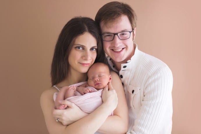newborn baby photo pose with parents