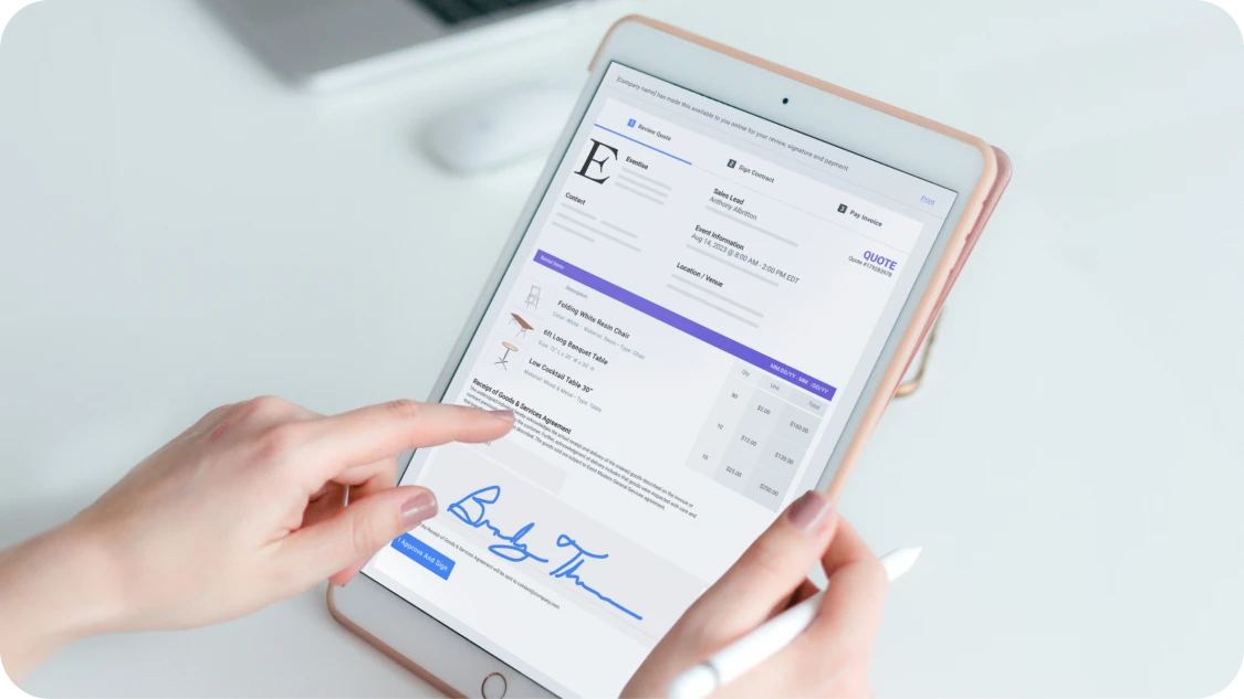 A demonstration of a client signing a contract on a tablet.