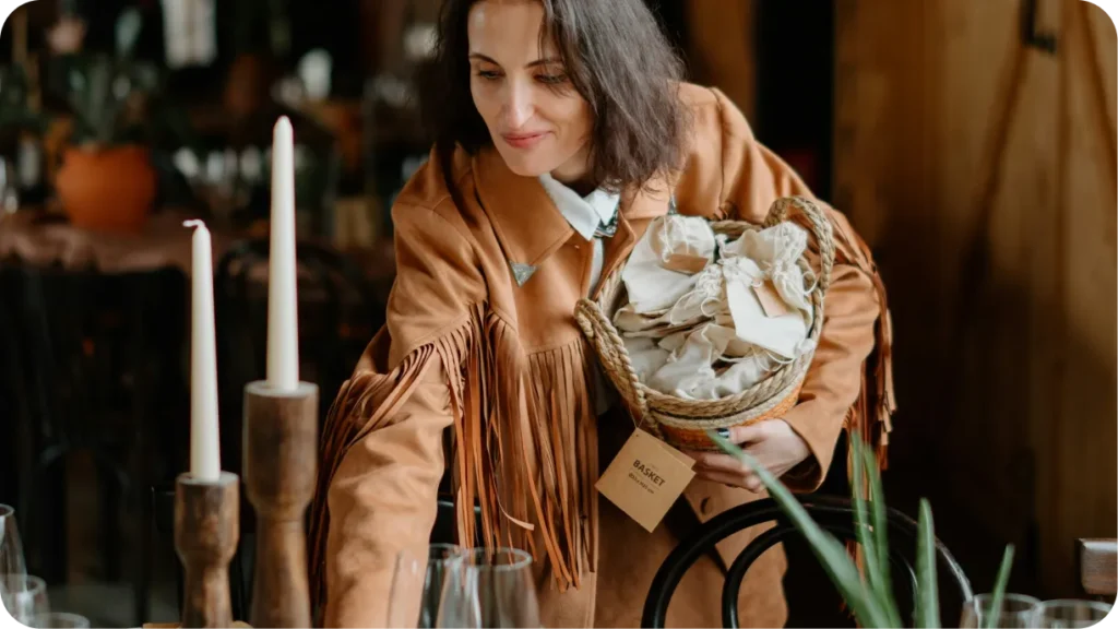 An event designer styling a decorated table setting at a venue