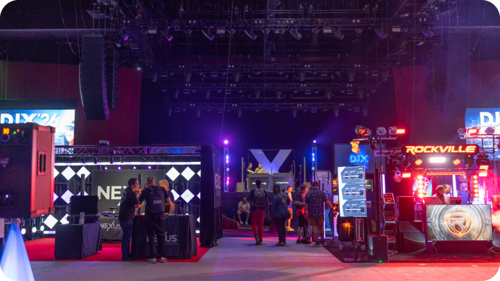 DJ gear booths and attendees on the DJX 2026 trade show floor at the Hard Rock in Atlantic City