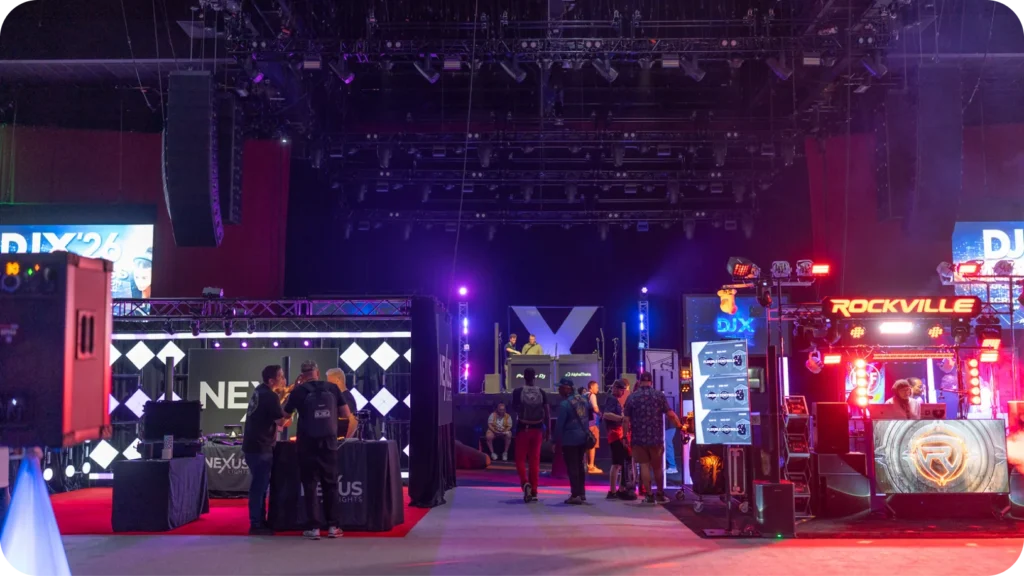 DJ gear booths and attendees on the DJX 2026 trade show floor at the Hard Rock in Atlantic City